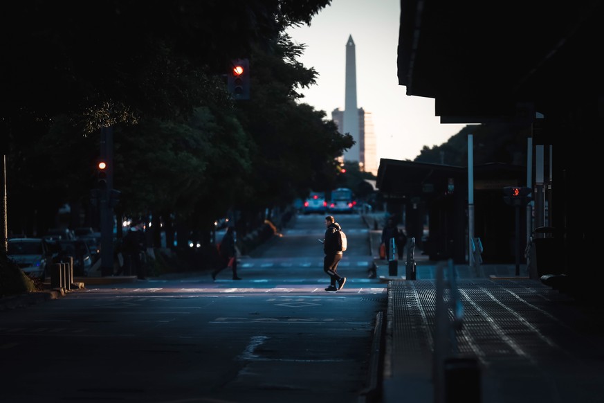 epa11329314 People walk down a street during the general strike in Buenos Aires, Argentina 09 May 2024. Calm is the general rule with which Argentina has lived since midnight (03:00 GMT), the beginnin ...