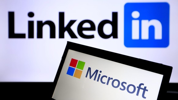 epa05361794 The logo of Microsoft windows and Professional social networking service LinkedIn is pictured in Taipei, Taiwan, 13 June 2016. According to reports, Microsoft is going to buy LinkedIn for  ...