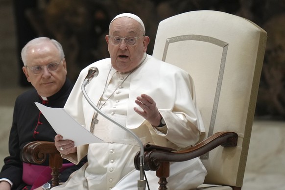 Pope Francis starts reading his speech during his weekly general audience in the Paul VI Hall, at the Vatican, Wednesday, Feb. 12, 2025. (AP Photo/Alessandra Tarantino)
Pope Francis