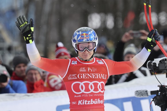 Switzerland&#039;s Marco Odermatt reacts after an alpine ski, men&#039;s World Cup downhill, in Kitzbuehel, Austria, Friday, Jan. 19, 2024. (AP Photo/Marco Trovati)