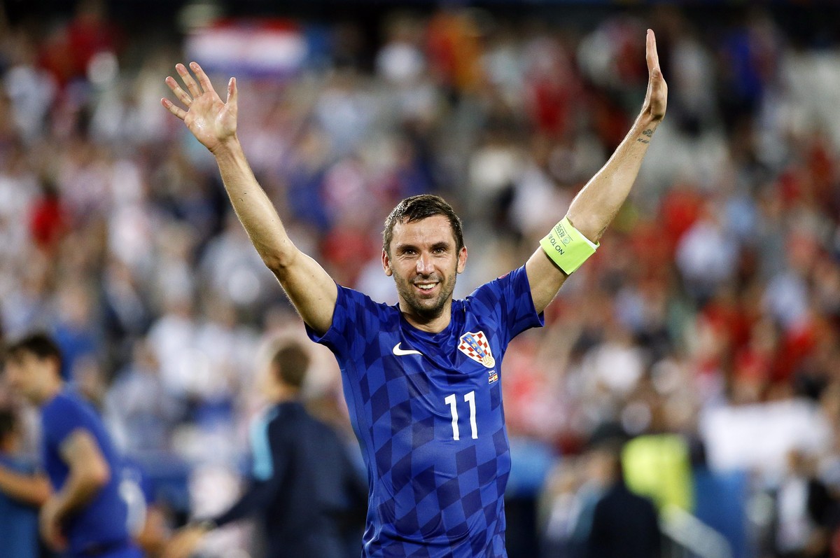 epa05382649 Croatia's Darijo Srna celebrates after the UEFA EURO 2016 group D preliminary round match between Croatia and Spain at Stade de Bordeaux in Bordeaux, France, 21 June 2016. Croatia won ...