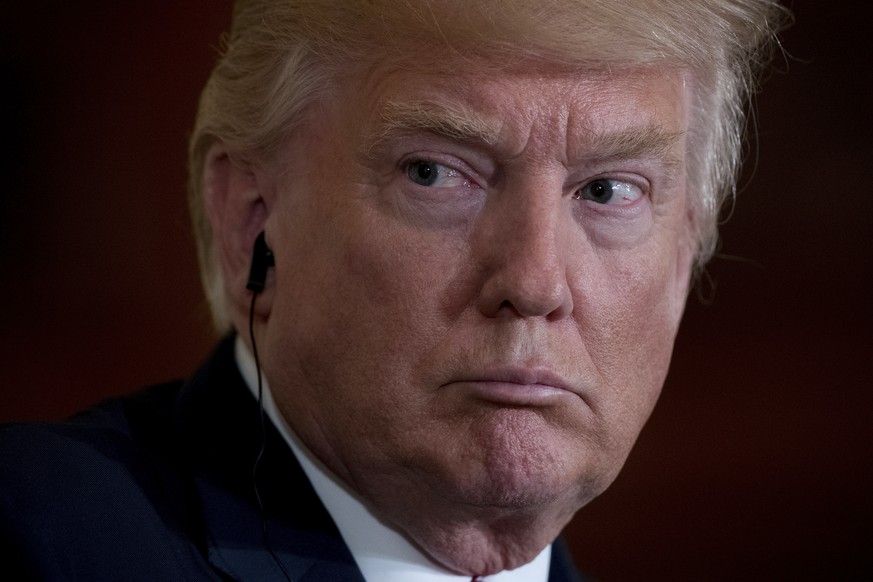 President Donald Trump listens as Italian Prime Minister Paolo Gentiloni speaks during a news conference in the East Room of the White House in Washington, Thursday, April 20, 2017. (AP Photo/Andrew H ...