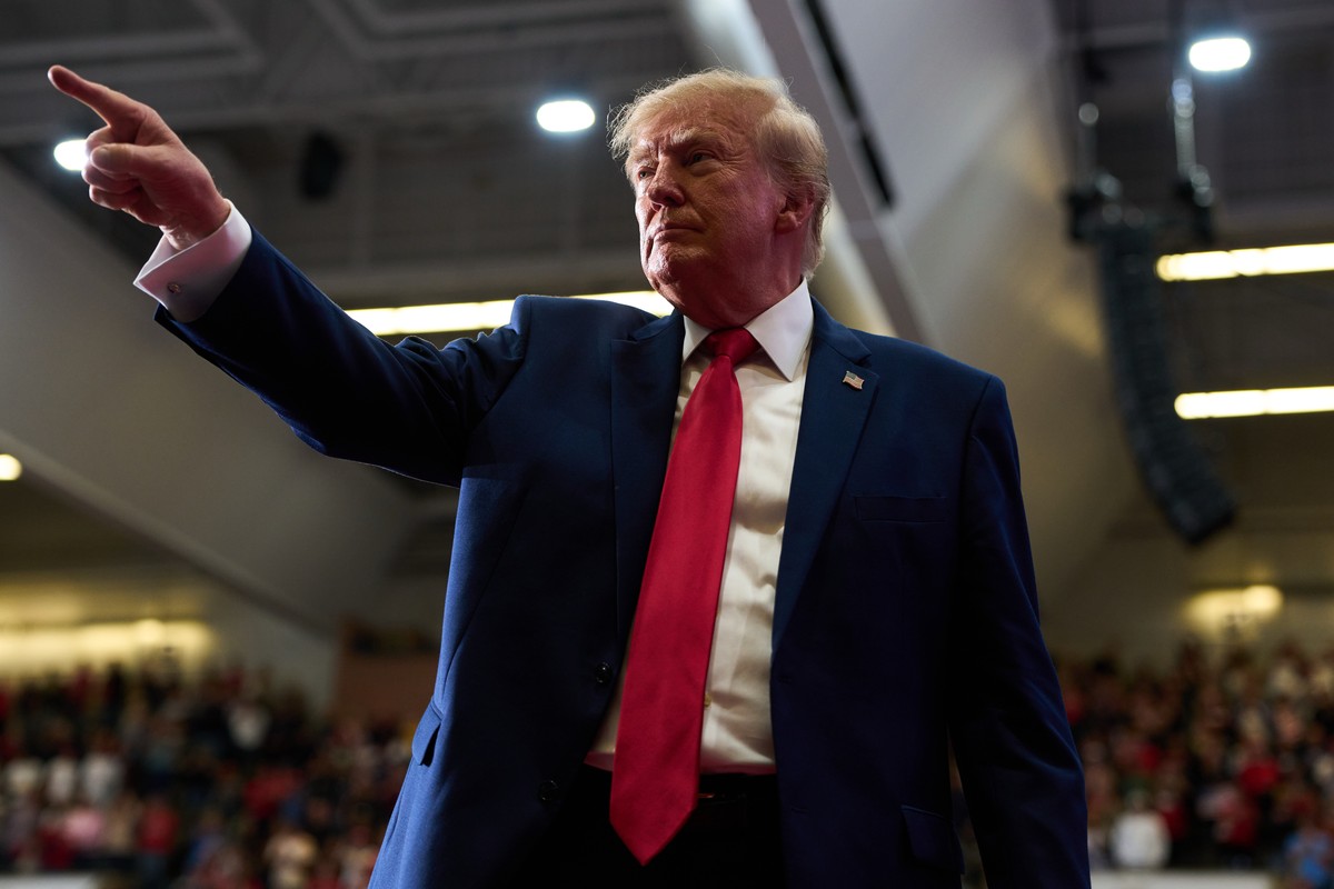 President Donald Trump points while departing after speaking during a campaign rally at McMorran Place Sports and Entertainment Center, Sunday, Oct. 25, 2026, in Port Huron, Mich. (AP Photo/Julia Dema ...