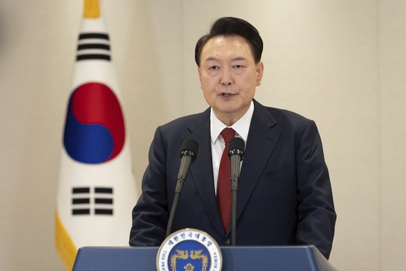 In this photo provided by South Korea Presidential Office, South Korean President Yoon Suk Yeol speaks at the presidential office in Seoul, South Korea, Thursday, Dec. 12, 2024. (South Korea President ...
