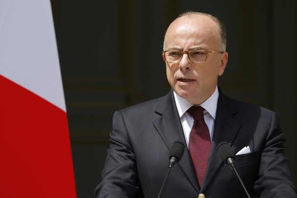 French Interior Minister Bernard Cazeneuve speaks at the ministry in Paris, France, June 22, 2016 after he authorised a short route allowing French trade unions to hold a protest march against labour  ...