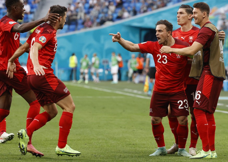 epa09318468 Xherdan Shaqiri (C) of Switzerland celebrates with team-mates afte scoring the 1-1 goal during the UEFA EURO 2020 quarter final match between Switzerland and Spain in St.Petersburg, Russia ...