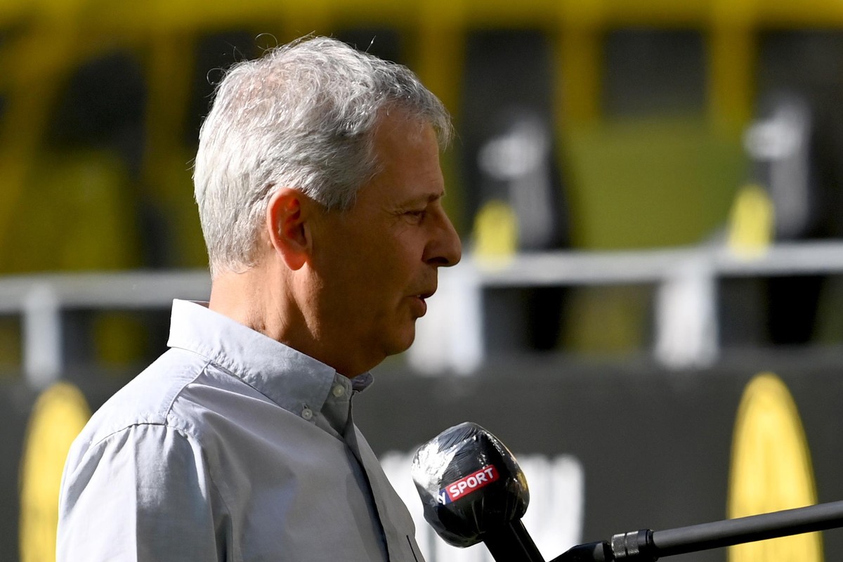 epa08445270 Dortmund's head coach Lucien Favre interviewed before the German Bundesliga soccer match between Borussia Dortmund and FC Bayern Munich at Signal Iduna Park in Dortmund, Germany, 26 M ...