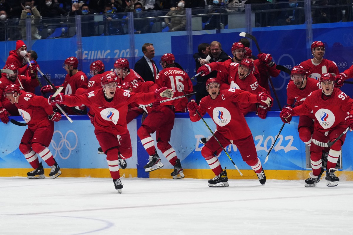 The Russian Olympic Committee celebrates the winning goal by Arseni Gritsyuk during a shootout in a men's semifinal hockey game against Sweden at the 2022 Winter Olympics, Friday, Feb. 18, 2022,  ...