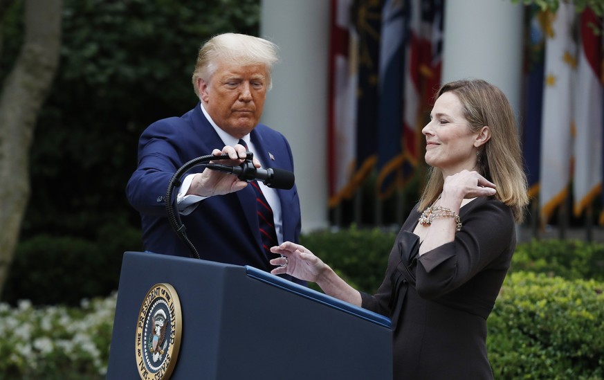 epa08767205 YEARENDER 2020.POLITICS..Judge Amy Coney Barrett (R) speaks after being introduced by US President Donald J. Trump as his nominee to be an Associate Justice of the Supreme Court during a c ...