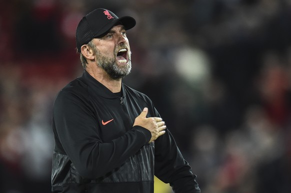 epa09470691 Manager Juergen Klopp of Liverpool FC reacts after the UEFA Champions League group B soccer match between Liverpool FC and AC Milan in Liverpool, Britain, 15 September 2021. EPA/Peter Powe ...