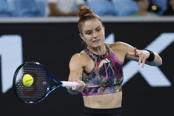 Maria Sakkari of Greece plays a forehand return to Zhu Lin of China during their third round match at the Australian Open tennis championship in Melbourne, Australia, Friday, Jan. 20, 2023. (AP Photo/ ...