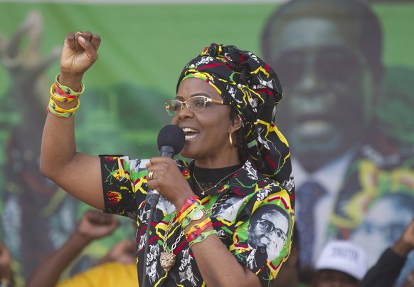 FILE - In this July, 29, 2017 file photo, Zimbabwe&#039;s first lady Grace Mugabe greets party supporters at a rally in Chinhoyi, Zimbabwe. Mugabe has moved a dramatic step closer to succeeding her hu ...