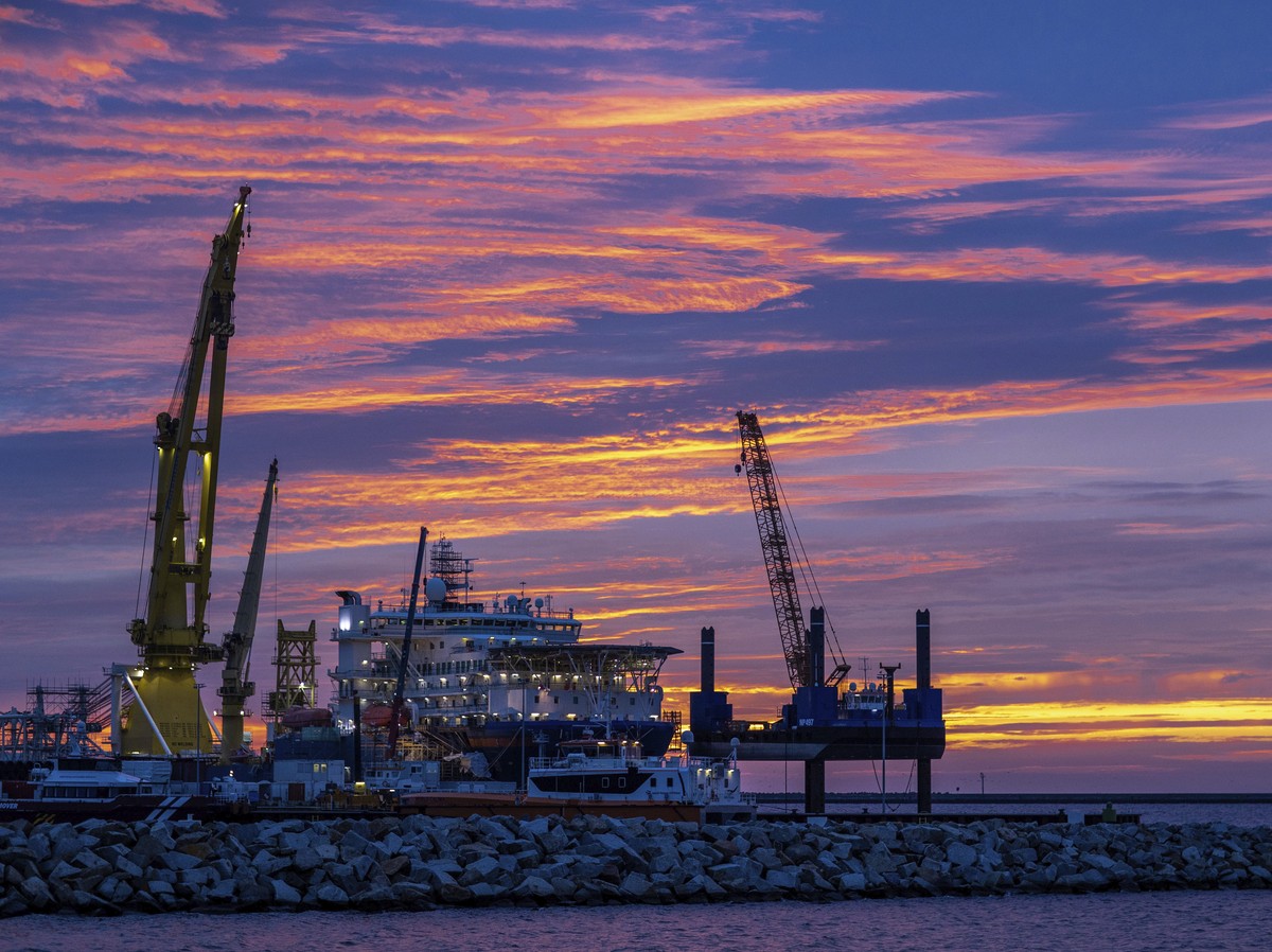 FILE - The Russian pipe-laying ship 'Akademik Tscherski' which is on deployment for the further construction of the Nord Stream 2 Baltic Sea pipeline, is moored at the port of Mukran on the  ...