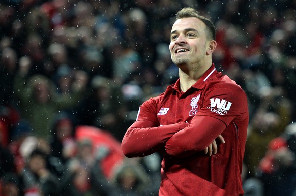 epa07236003 Xherdan Shaqiri of Liverpool celebrates after scoring during the English Premier League soccer match between Liverpool FC and Manchester United FC at Anfield in Liverpool, Britain, 16 Dece ...