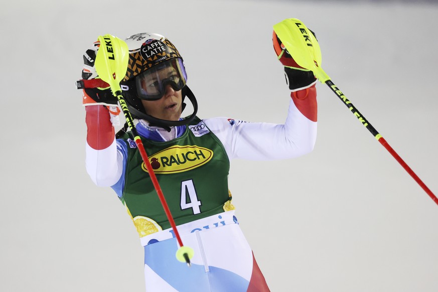 Switzerland&#039;s Wendy Holdener celebrates as she arrives at the finish area during the second run of an alpine ski, World Cup women&#039;s slalom in Levi, Finland, Saturday, Nov. 20, 2021. (AP Phot ...