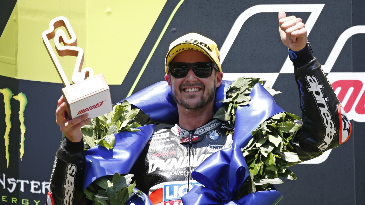 Swiss Tom Luethi celebrates after his second place at the Moto2 Catalunya Motorcycle Grand Prix at the Barcelona Catalunya racetrack in Montmelo, near Barcelona, Spain, on Sunday June 16, 2019. (AP Ph ...