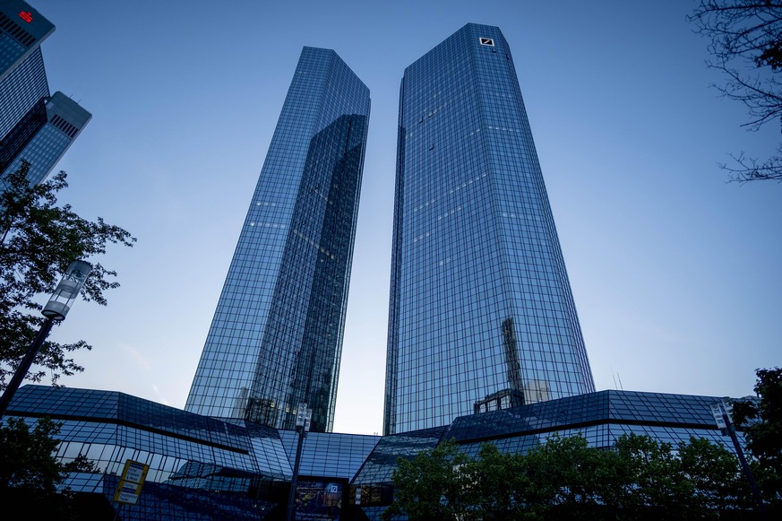 The headquarters of Deutsche Bank is seen in Frankfurt, Germany, Monday, May 18, 2020. The bank will hold a virtual annual shareholders meeting in Wednesday. (AP Photo/Michael Probst)
