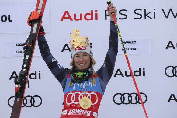 FILE - United States&#039; Mikaela Shiffrin celebrates on the podium after winning an alpine ski, women&#039;s World Cup giant slalom, her 83rd World Cup race, in Kronplatz, Italy, Tuesday, Jan. 24, 2 ...