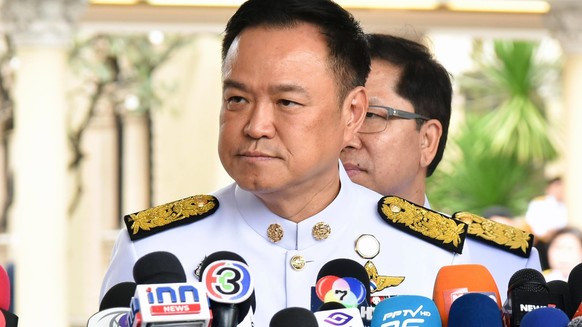 epa12586705 A handout photo made available by the Royal Thai Government shows Thai Prime Minister Anutin Charnvirakul speaking to journalists after dissolving the Thai Parliament, at Government House  ...