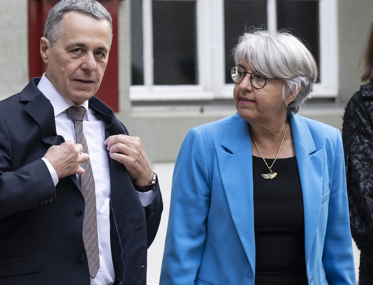 Swiss Federal Councilor Guy Parmelin , Ignazio Cassis and Elisabeth Baume-Schneider, from left, speak before welcome Maia Sandu President of the Republic of Moldova, during a official visit to Switzer ...