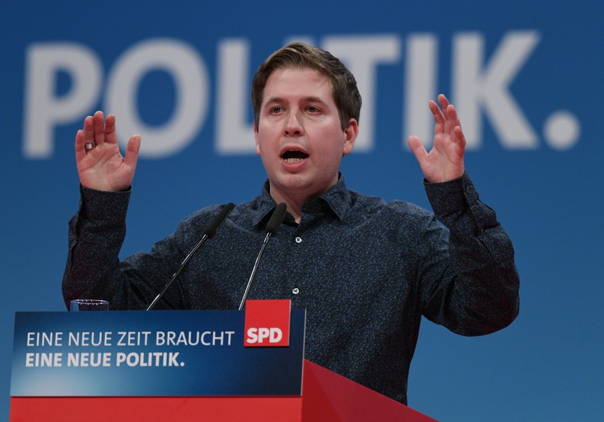 epa06460583 Kevin Kuehnert, chairman of the youth organization of the Social Democratic Party (SPD), the &#039;Young Socialists&#039;, (Junge Sosialisten, or Jusos), delivers his speech during the ext ...