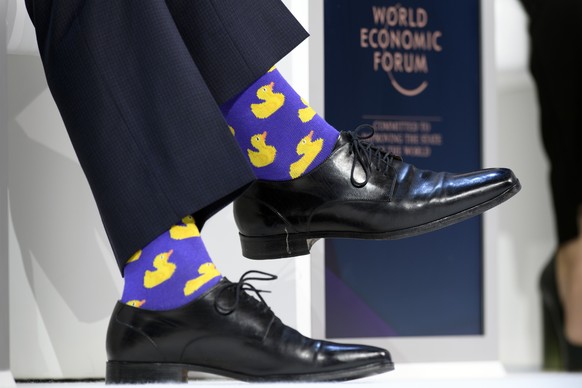 Justin Trudeau, Prime Minister of Canada, sports duck socks are pictured during a plenary session in the Congress Hall during the 48th Annual Meeting of the World Economic Forum, WEF, in Davos, Switze ...