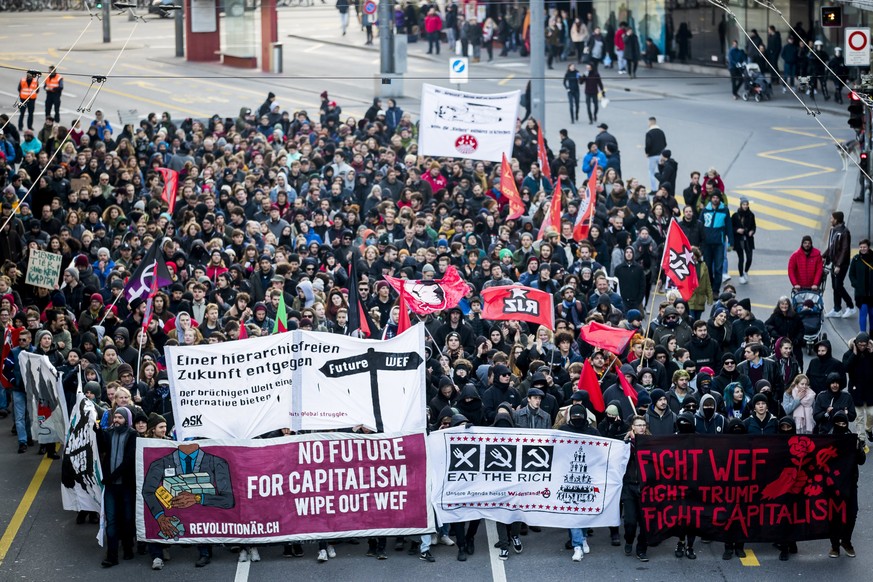 epa06436050 Protesters demonstrate against the World Economic Forum (WEF) and US president Donald Trump, in Bern, Switzerland, 13 January 2018. The WEF will take place from January 23 till January 26  ...