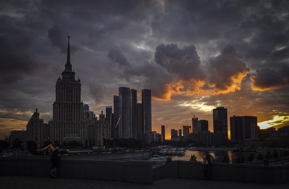 epa10818443 Hotel Radisson Collection former hotel Ukraine (L) and Moscow City business center (C) during sunset in Moscow, Russia, 24 August 2023. Moscow was attacked by three drones on 23 August 202 ...