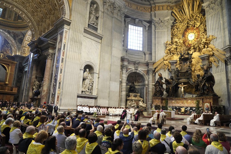 Pope Francis, background center, delivers his message as he meets pilgrims from Concesio and Sotto il Monte on the 60th anniversary of the death of Pope John XXIII and the election of Paul VI in…