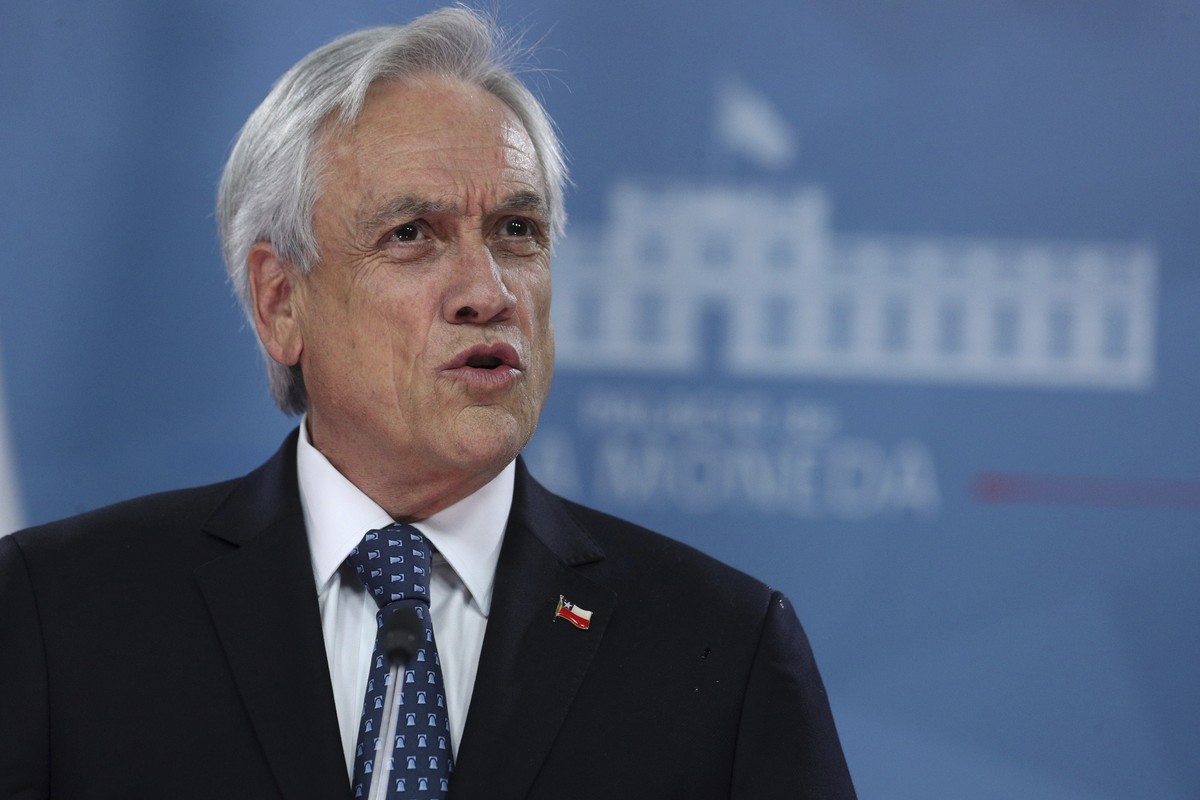 Chile's President Sebastian Pinera deliver an address to the nation in La Moneda presidential palace in Santiago, Chile, Tuesday, Nov. 12, 2019. Students in Chile began protesting nearly a month  ...