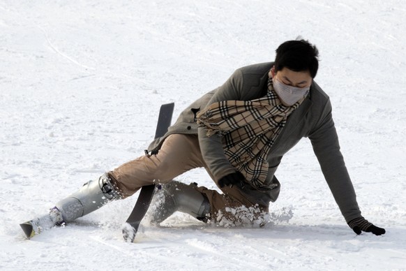 Skifahren in Peking: Der Ausnahmezustand hält die Bevölkerung nicht davon ab, Zerstreuung zu suchen.