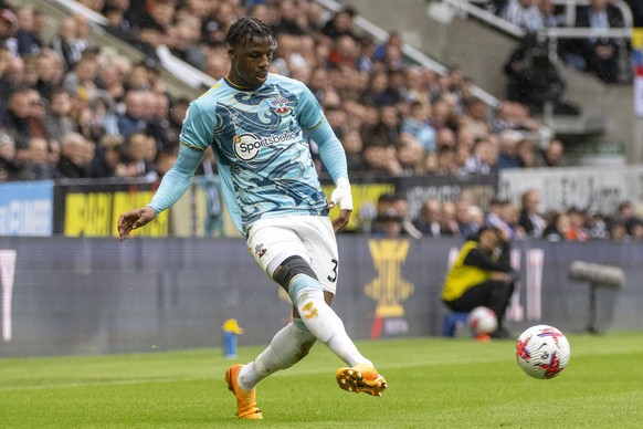 NEWCASTLE UPON TYNE, ENGLAND - APRIL 30: Armel Bella-Kotchap of Southampton passes the ball during the Premier League match between Newcastle United and Southampton FC at St. James Park on April 30, 2 ...