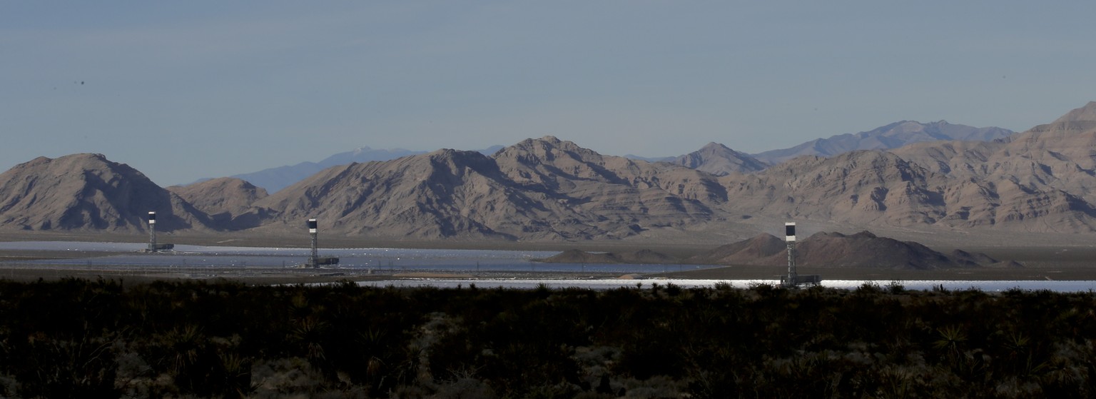 Some of the 300,000 computer-controlled mirrors, each about 7 feet high and 10 feet wide, reflect sunlight to boilers that sit on 459-foot towers. The sun&#039;s power is used to heat water in the boi ...