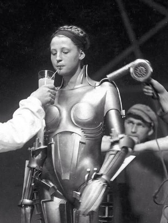 Brigitte Helm on the set of Metropolis (1927) 
https://en.wikipedia.org/wiki/Metropolis_(1927_film)#/media/File:Brigitte_Helm_on_the_set_of_Metropolis.png