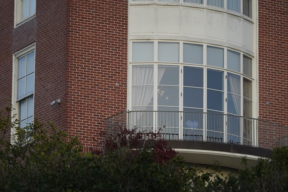 A heart shaped sculpture and a light on are seen inside a window of the home of House Speaker Nancy Pelosi and her husband Paul Pelosi in San Francisco, Friday, Oct. 28, 2022. Paul Pelosi, was attacke ...