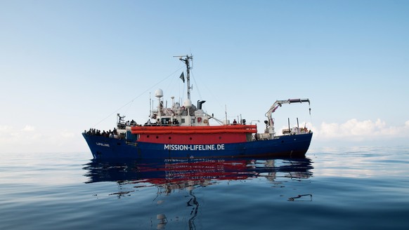 epa06828475 A handout photo made available by German NGO Mission Lifeline shows migrants rescued in international waters of the Mediterranean Sea onboard of the dutch flagged vessel LIFELINE, 21 June  ...