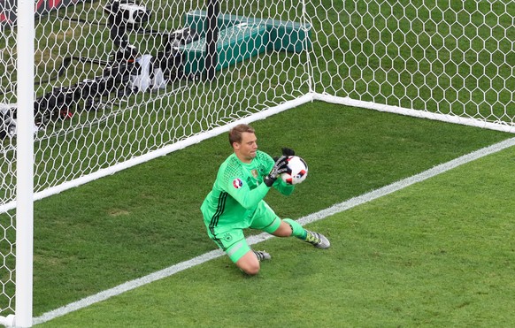 Germany goalkeeper Manuel Neuer saves a ball during the Euro 2016 semifinal soccer match between Germany and France, at the Velodrome stadium in Marseille, France, Thursday, July 7, 2016. (AP Photo/Th ...