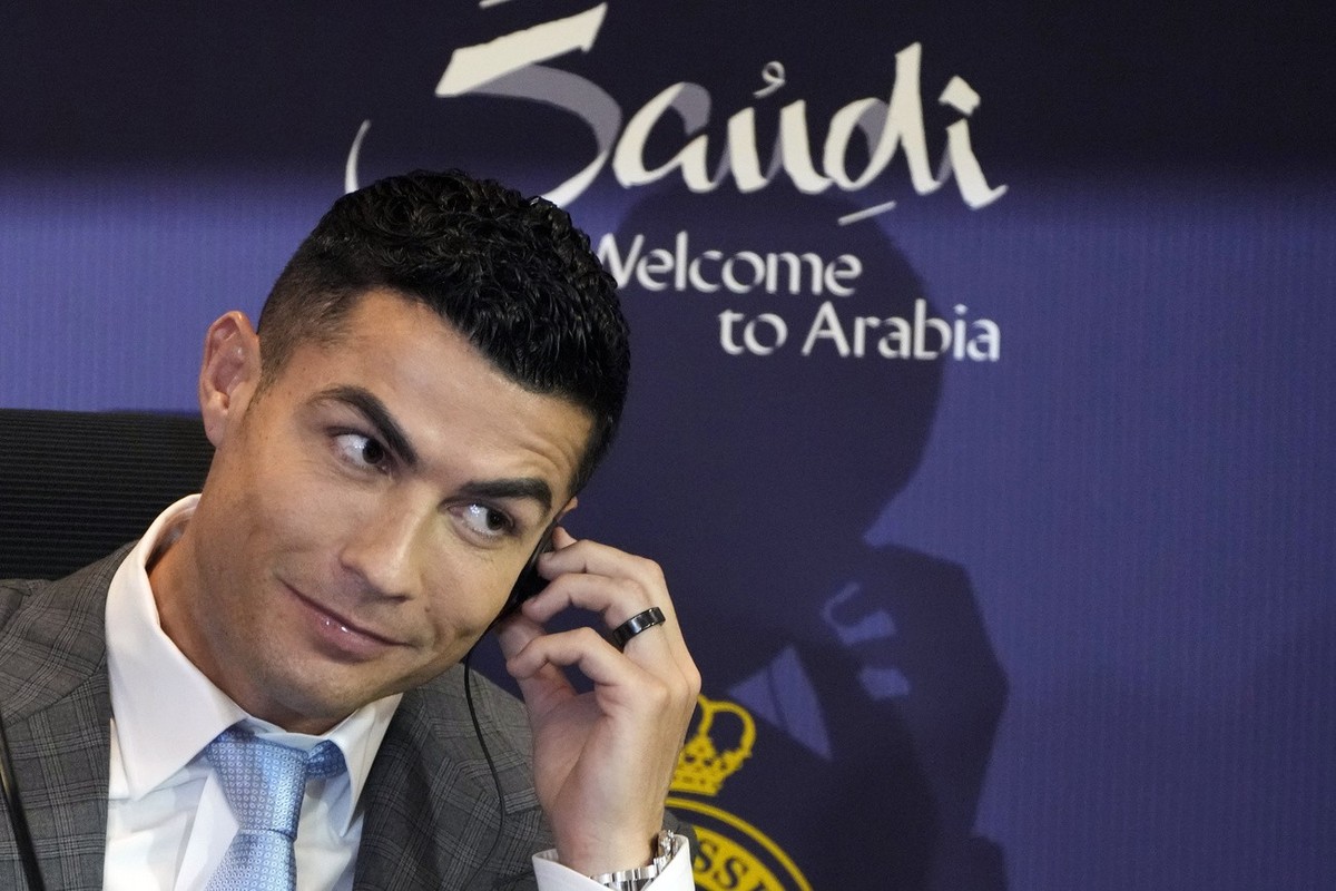 FILE - Soccer star Cristiano Ronaldo speaks during a press conference for his official unveiling as a new member of Al Nassr soccer club in in Riyadh, Saudi Arabia, Tuesday, Jan. 3, 2023. One of socce ...