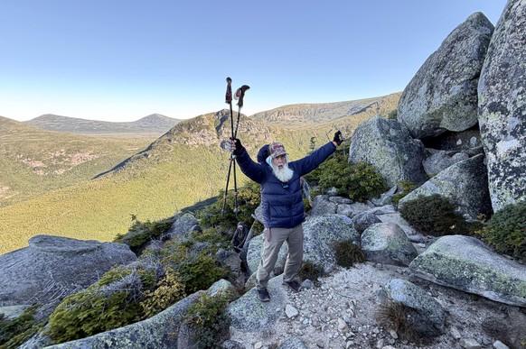 Dale Sanders, 91, celebrates after completing a difficult section of Mt. Katahdin, Monday, Aug. 31, 2026, in Baxter State Park in Piscataquis County, Maine. (AP Photo/Robert F. Bukaty)
Appalachian Tra ...