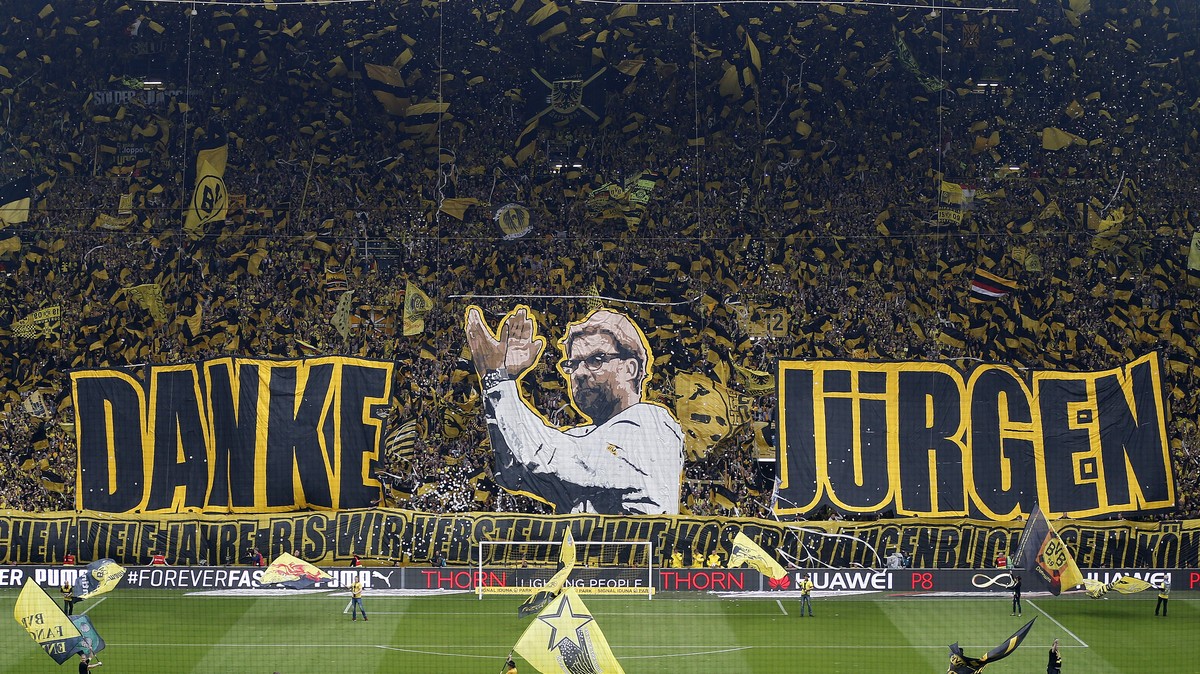 Dortmund supporters show banners to thank Dortmund's head coach Juergen Klopp prior to the German first division Bundesliga soccer match between BvB Borussia Dortmund and Werder Bremen in Dortmun ...