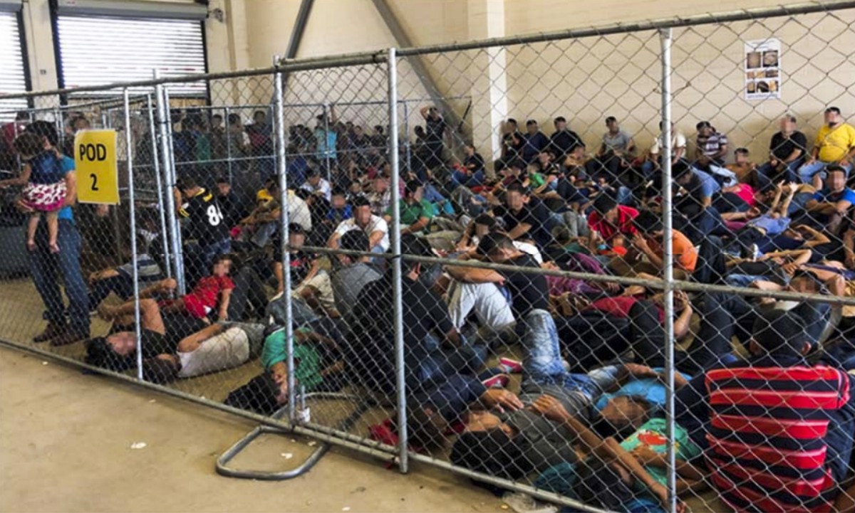 epa07690958 A handout photo made available by the Office of the Inspector General made available on 02 July 2019 shows overcrowded conditions at the US Border Patrol's McAllen holding station in  ...