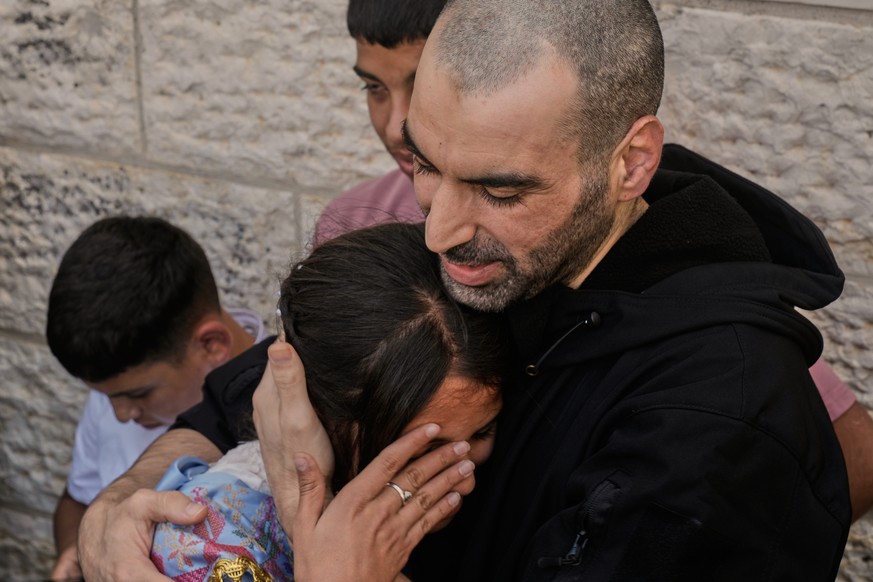 A Palestinian prisoner who was released from an Israeli prison as part of a ceasefire deal between Israel and Hamas, upon his arrival in the West Bank city of Ramallah, Monday, Oct. 13, 2025. (AP Phot ...