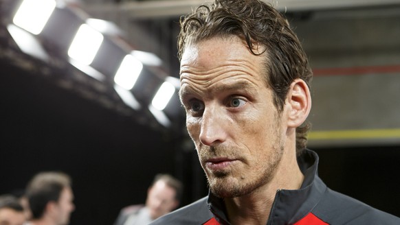 Patrick Fischer, head coach of Switzerland national ice hockey team, speaks to the media, during a Swiss team training optional session of the IIHF 2018 World Championship, at the Royal Arena, in Cope ...