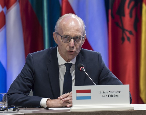 epa13188992 Luxembourg's Prime Minister Luc Frieden (L), and Moldova's President Maia Sandu (R) attend a joint press conference during the Coalition of the Willing summit in Kyiv, Ukraine, 2 ...