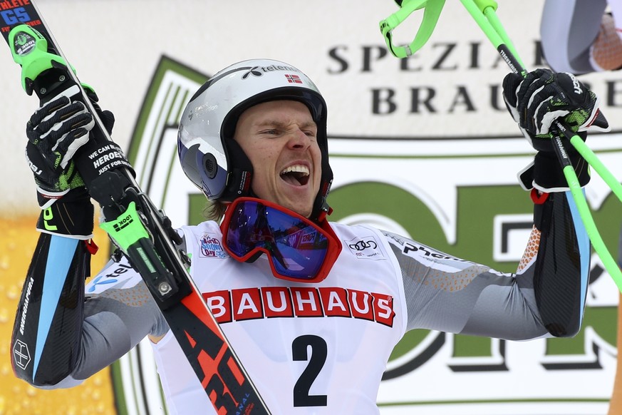 Norway&#039;s Henrik Kristoffersen celebrates at the finish area of an alpine ski, men&#039;s World Cup giant slalom, in Alta Badia, Italy, Sunday, Dec. 22, 2019. (AP Photo/Alessandro Trovati)