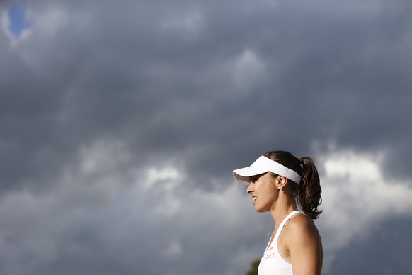 epa06291011 FILE --- Martina Hingis of Switzerland during the doubles match with Sania Mirza of India against Anna-Lena Friedsam and Laura Siegemund of Germany, at the All England Lawn Tennis Champion ...