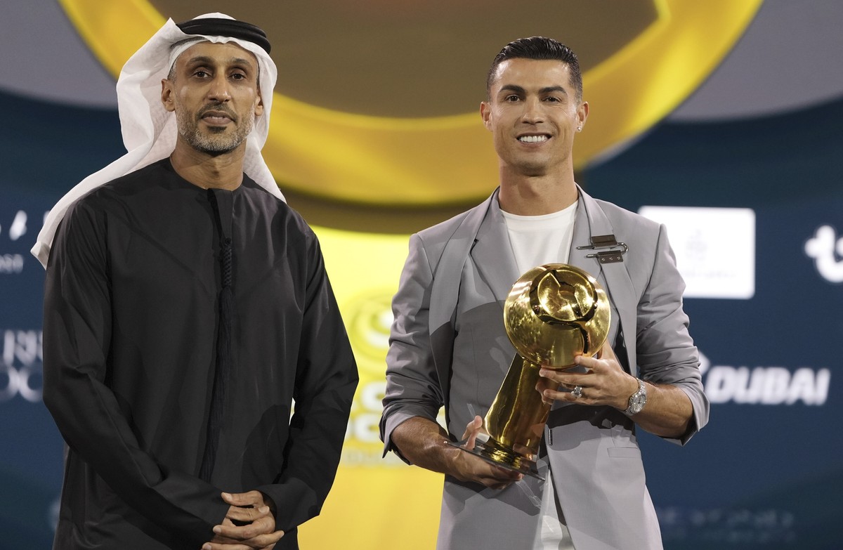 Al Nassr's Cristiano Ronaldo poses with an award, during the Globe Soccer Awards 2025, in Dubai, UAE, Friday, Dec. 27, 2024. (Fabio Ferrari/LaPresse via AP)