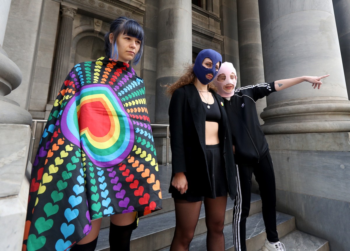 epa07416282 Members of Russian Punk Band Pussy Riot and Amnesty international Australia rally outside the South Australian Parliament for justice for Chechen LGBTQ community in Adelaide, Australia, 06 ...