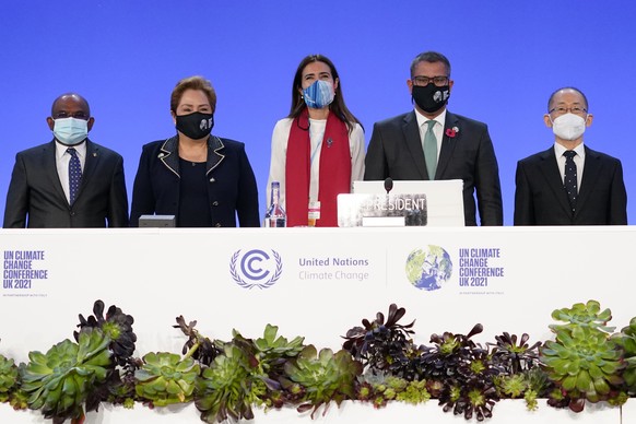 Dr. Hoesung Lee, chair of the IPCC (Intergovernmental Panel on Climate Change), Alok Sharma, President of the COP26 summit, outgoing COP president Carolina Schmidt, Patricia Espinosa, UNFCCC Executive ...