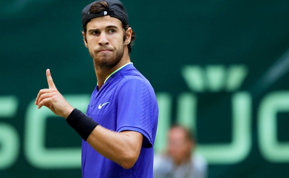 epa06047408 Karen Khachanov of Russia reacts during his semi final match against Roger Federer of Switzerland at the ATP tennis tournament in Halle, Germany, 24 June 2017. EPA/TYLER LARKIN